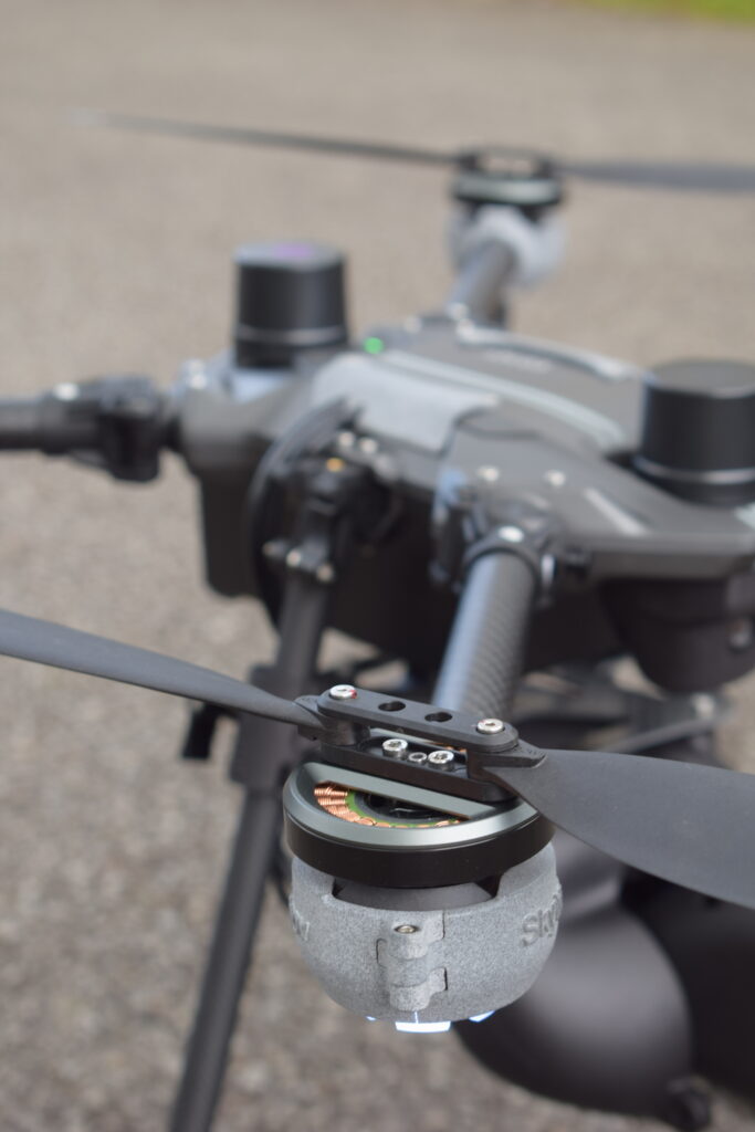 Détail du système de pulvérisation d'un drone de nettoyage